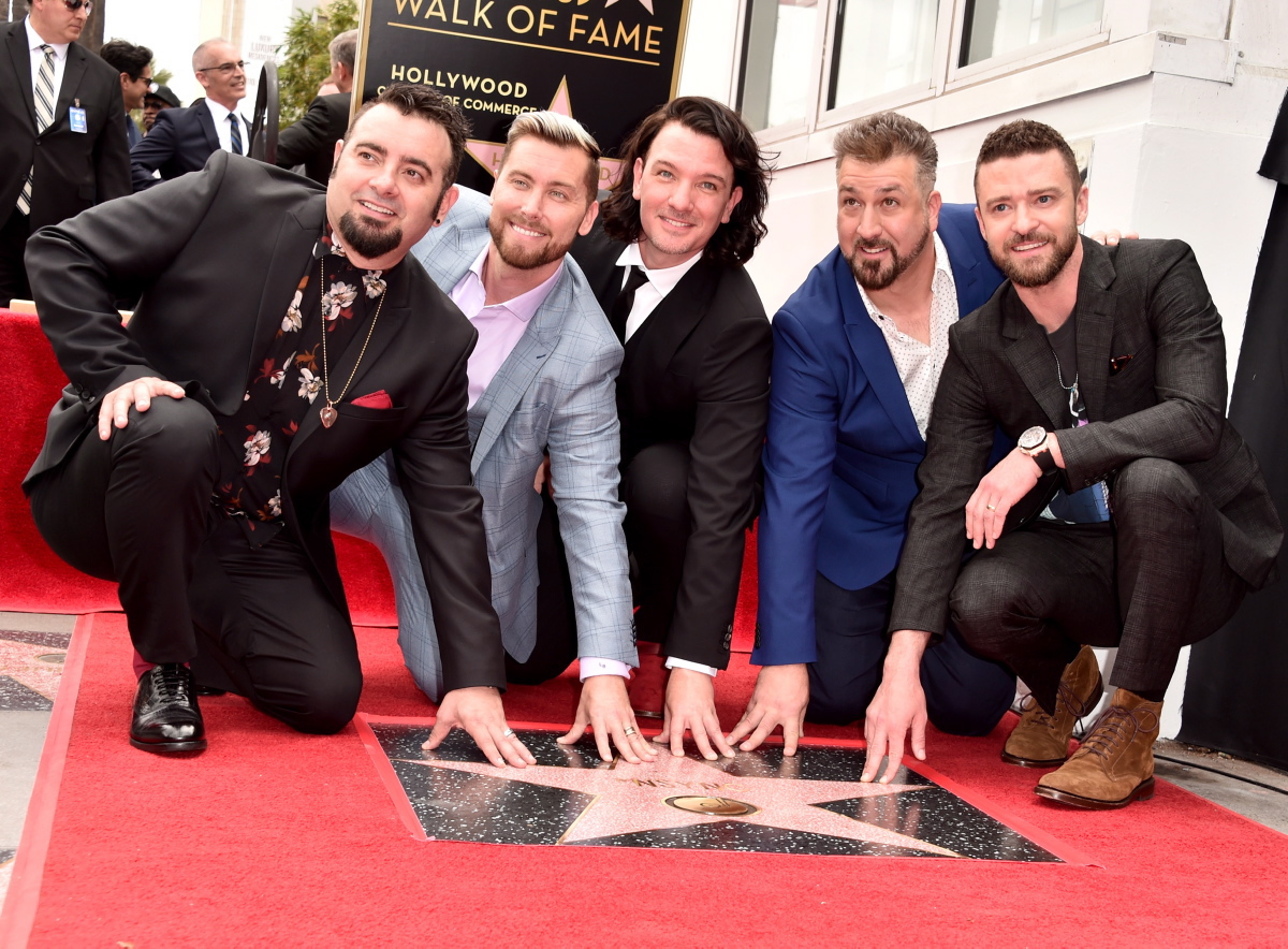 The band is back together, sort of. NSYNC reunited for the group's Hollywood Walk of Fame ceremony on April 30, 2018. (From left) Chris Kirkpatrick, Lance Bass, JC Chasez, Joey Fatone and Justin Timberlake were all smiles as they posed with the new star.