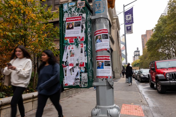 NEW YORK, NEW YORK - OCTOBER 30: Posters of some of those kidnapped by Hamas in Israeli are displayed on a pole outside of New York University (NYU) as tensions between supporters of Palestine and Israel increase on college campuses across the nation on October 30, 2023 in New York City. The Biden administration is announcing new actions in an attempt to crack down on antisemitic incidents on college campuses following the Hamas terror attacks on Israel. Many Jewish and Israeli students have felt threatened after large and vocal demonstrations against the fighting in Gaza broke out at numerous universities. (Photo by Spencer Platt/Getty Images) ** OUTS - ELSENT, FPG, CM - OUTS * NM, PH, VA if sourced by CT, LA or MoD **