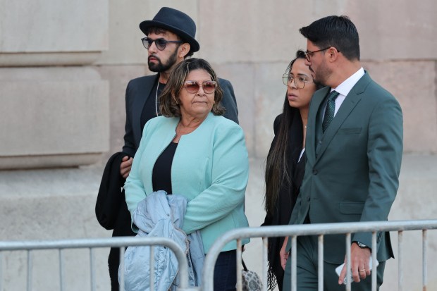 Lucia Alves (2nd-L), mother of Brazilian footballer Dani Alves, arrives for his trial with the family's lawyer Graziele Queiroz (2nd-R) and two of her sons, at the High Court of Justice of Catalonia in Barcelona, on February 5, 2024. Brazilian footballer Dani Alves, a former star at Barca and PSG, goes on trial in Barcelona accused of raping a woman in a local nightclub. Prosecutors are asking for a nine-year prison sentence, followed by 10 years of conditional liberty. They are also asking he pay 150,000 euros ($162,000) in compensation to the woman. (Photo by LLUIS GENE / AFP) (Photo by LLUIS GENE/AFP via Getty Images) ** OUTS - ELSENT, FPG, CM - OUTS * NM, PH, VA if sourced by CT, LA or MoD **