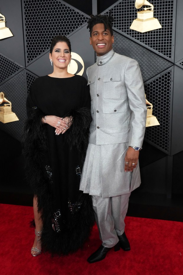 Suleika Jaouad, left, and Jon Batiste arrive at the 66th annual Grammy Awards on Sunday, Feb. 4, 2024, in Los Angeles.