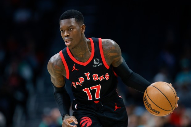 Toronto Raptors guard Dennis Schroder brings the ball up court during the first half of an NBA basketball game against the Charlotte Hornets in Charlotte, N.C., Wednesday, Feb. 7, 2024. (AP Photo/Nell Redmond)