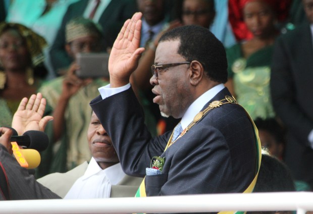 Newly elected Namibian president Hage Geingob is sworn in as Namibia's third president at an inauguration ceremony in Windhoek, Saturday, March 21, 2015. (AP Photo/Dirk Heinrich)