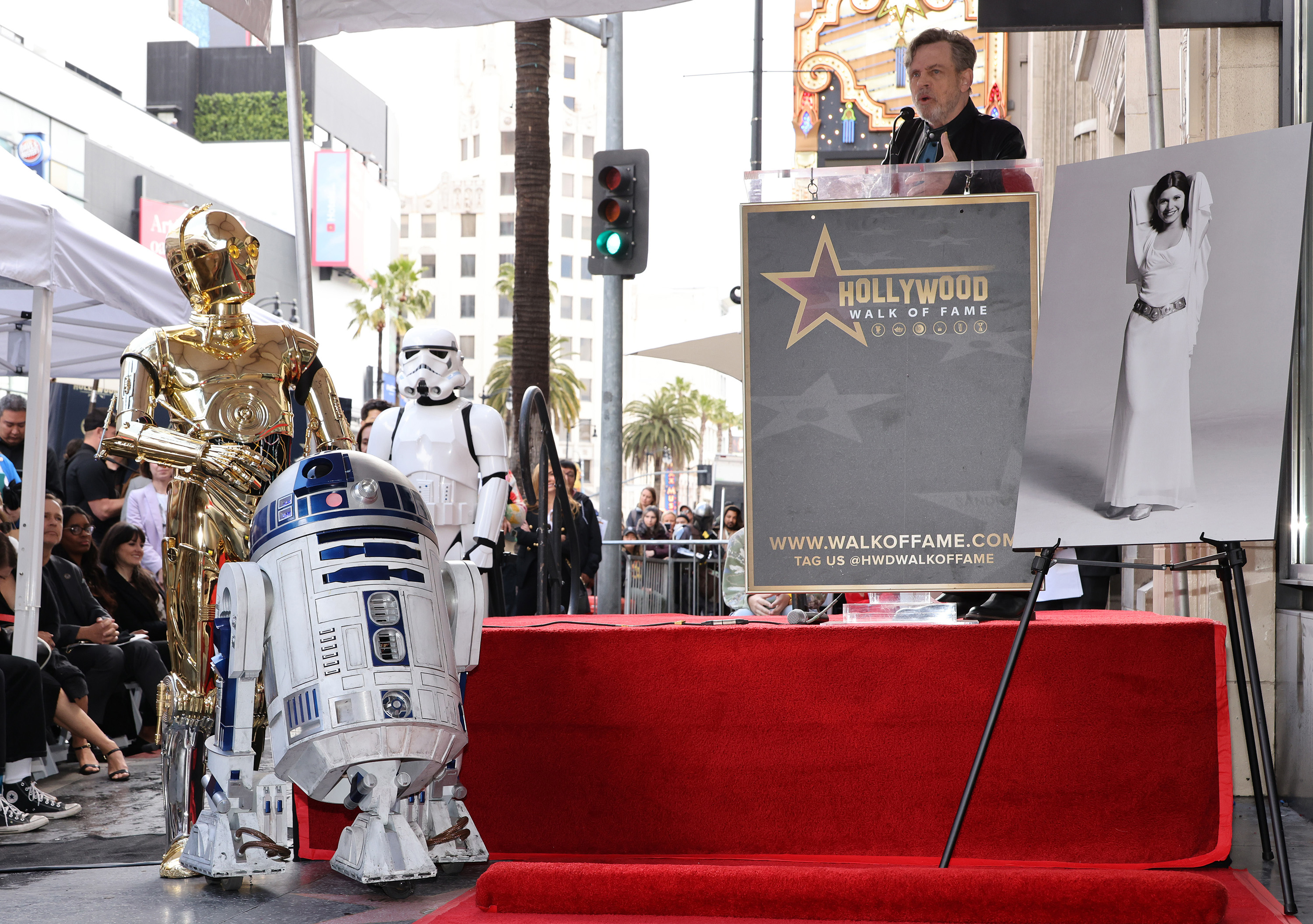 Mark Hamill speaks onstage during the ceremony for Carrie Fisher being honored posthumously with a star on the Hollywood Walk of Fame on May 04, 2023, in Hollywood, Calif.