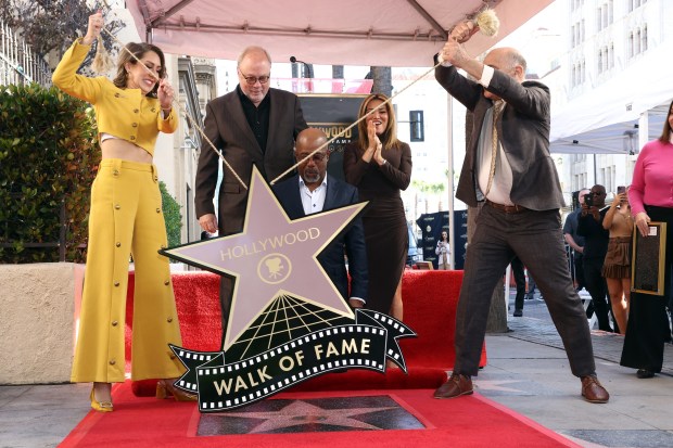 TOPSHOT - (From top L) Sarah Zurell, Mike Dungan, Kit Hoover and Steve Nissen unveil US singer-songwriter Darius Rucker's (C) Hollywood Walk of Fame star in Hollywood, California, on December 4, 2023. (Photo by TOMMASO BODDI / AFP) (Photo by TOMMASO BODDI/AFP via Getty Images)