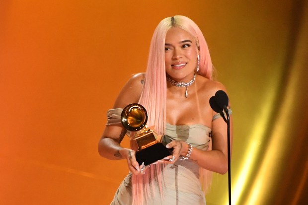 Colombian singer Karol G accepts the Best Musica Urbana Album award for "Manana Sera Bonito" on stage during the 66th Annual Grammy Awards at the Crypto.com Arena in Los Angeles on February 4, 2024. (Photo by Valerie Macon / AFP) (Photo by VALERIE MACON/AFP via Getty Images)