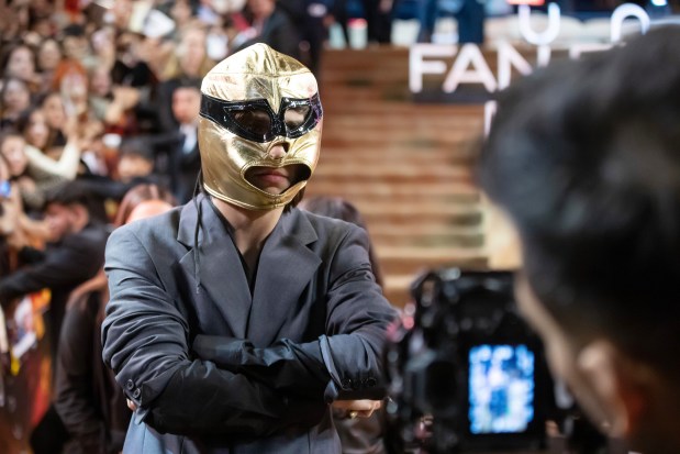 MEXICO CITY, MEXICO - FEBRUARY 6: Timothée Chalamet pose for photos with a wrestling mask during the red carpet for the movie 'Dune: Part Two' at Auditorio Nacional on February 6, 2024 in Mexico City, Mexico. (Photo by Angel Delgado/Getty Images)