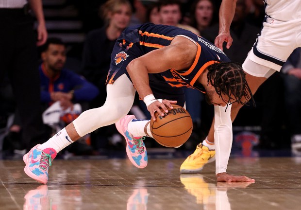 Jalen Brunson #11 of the New York Knicks slips in the second half against the Memphis Grizzlies at Madison Square Garden on February 06, 2024 in New York City. (Elsa/Getty Images)