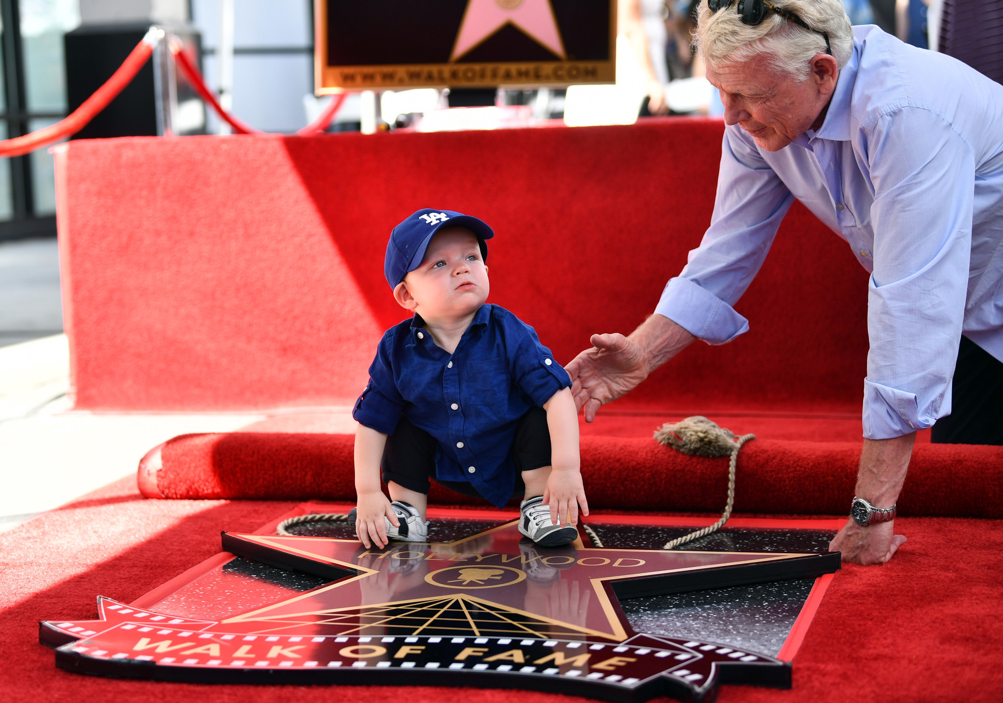 Kirsten Dunst's 15-month-old son Ennis Howard Plemons attends poses next to her new star of the Hollywood Walk of Fame during the star ceremony on Aug. 29, 2019.