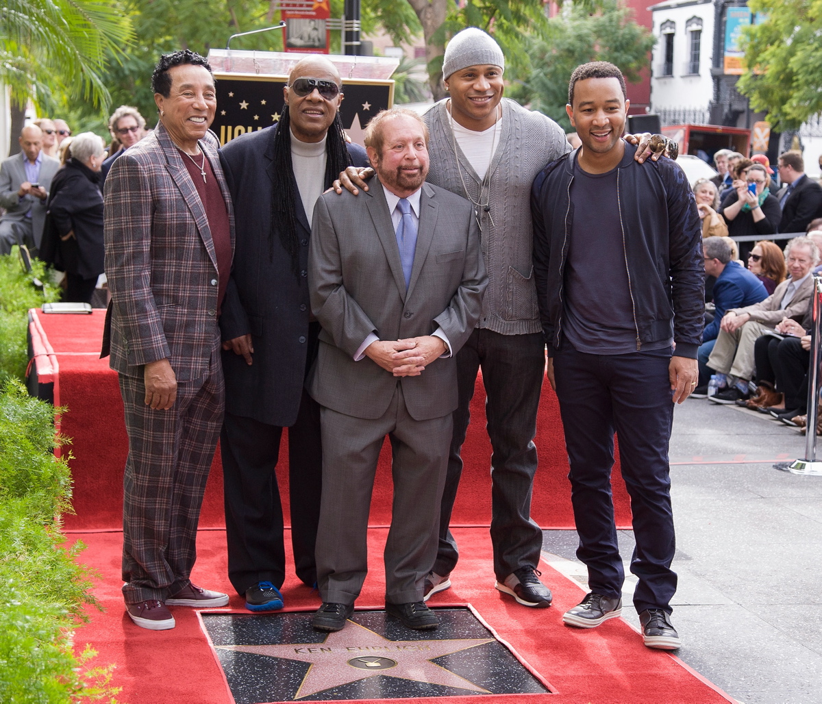 Television producer and director Ken Erhlich (c.) poses alongside musicians (l. to r.) Smokey Robinson, Stevie Wonder, LL Cool J and John Legend during his Hollywood Walk of Fame ceremony on Jan. 28, 2015.