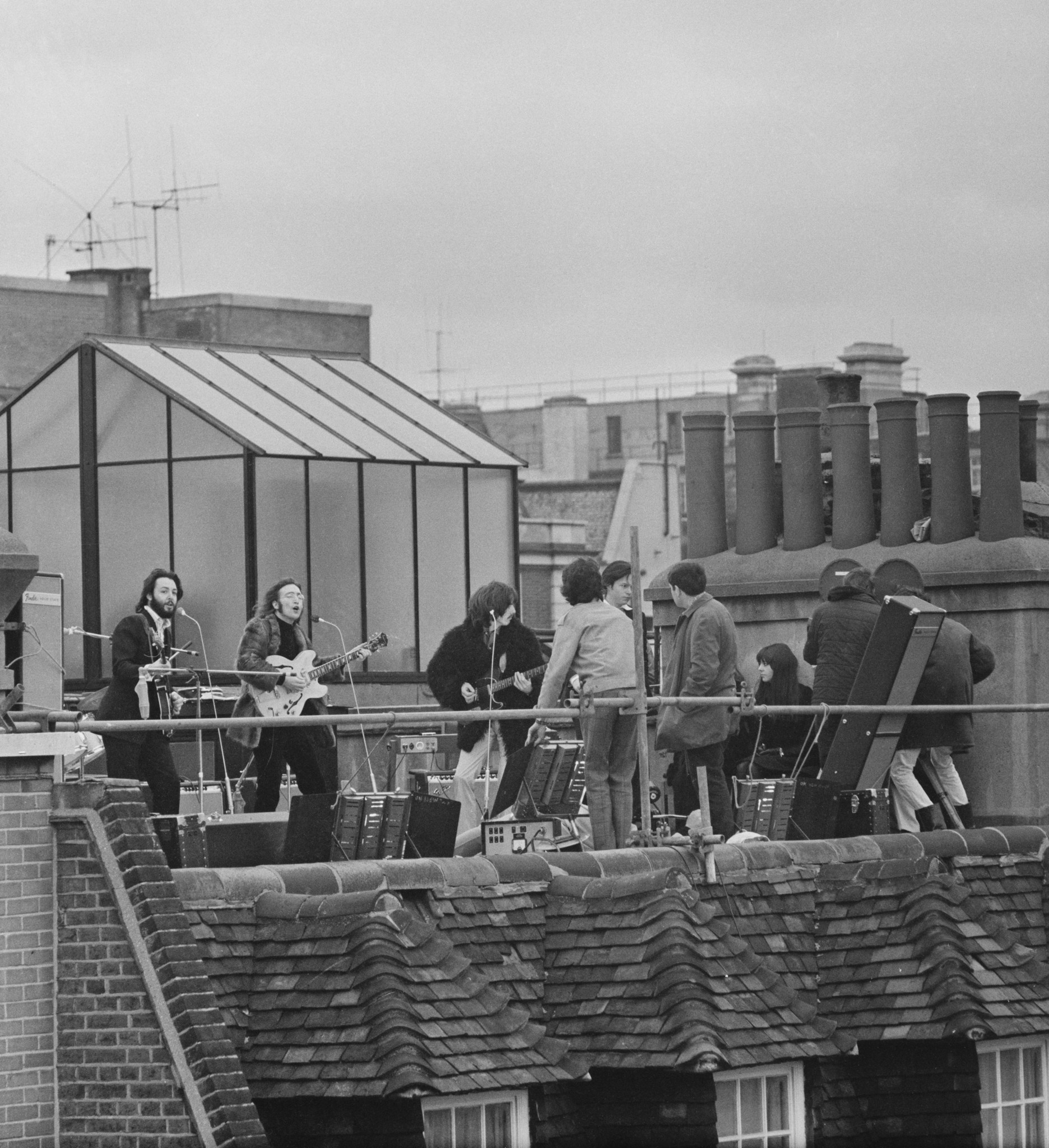 The Beatles perform their last live public concert on the rooftop of the Apple Organization building for director Michael Lindsey-Hogg's film documentary 