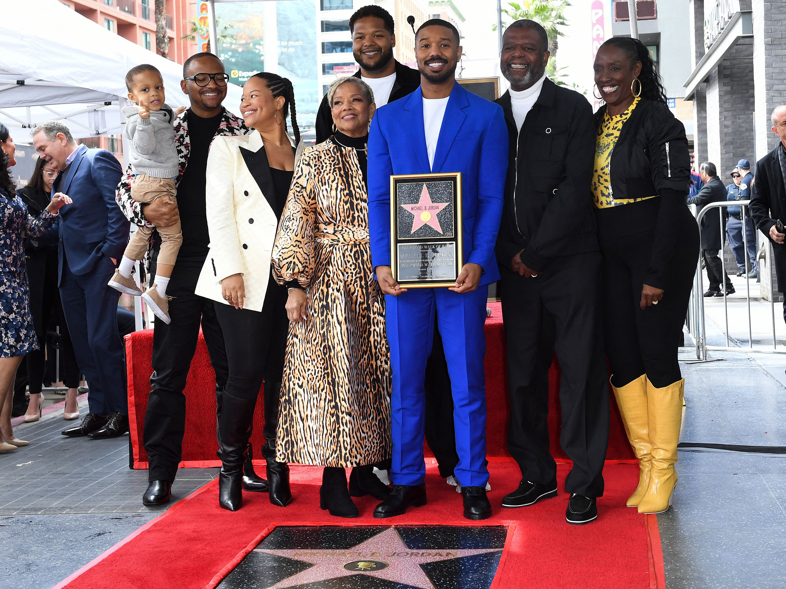 U.S. actor/director Michael B. Jordan (C) and his family pose during the unveiling of his Hollywood Walk of Fame star during a ceremony in Hollywood, Calif. on March 1, 2023.