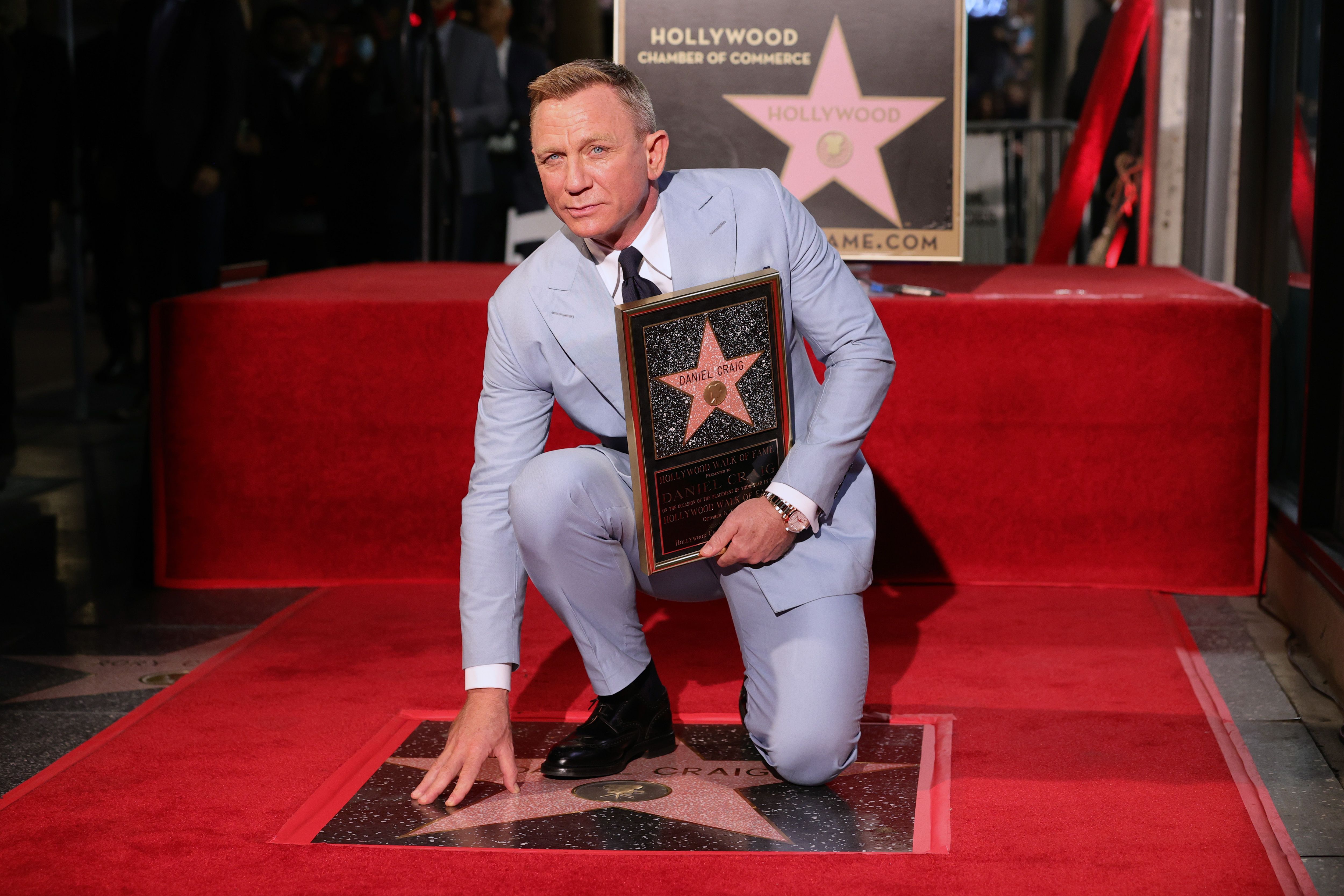 Daniel Craig poses with his star during the Hollywood Walk of Fame Star Ceremony for Daniel Craig on Oct. 6, 2021, in Hollywood, Calif. Craig's star will be located at 7007 Hollywood Boulevard, chosen for Craig's portrayal of James Bond in the 