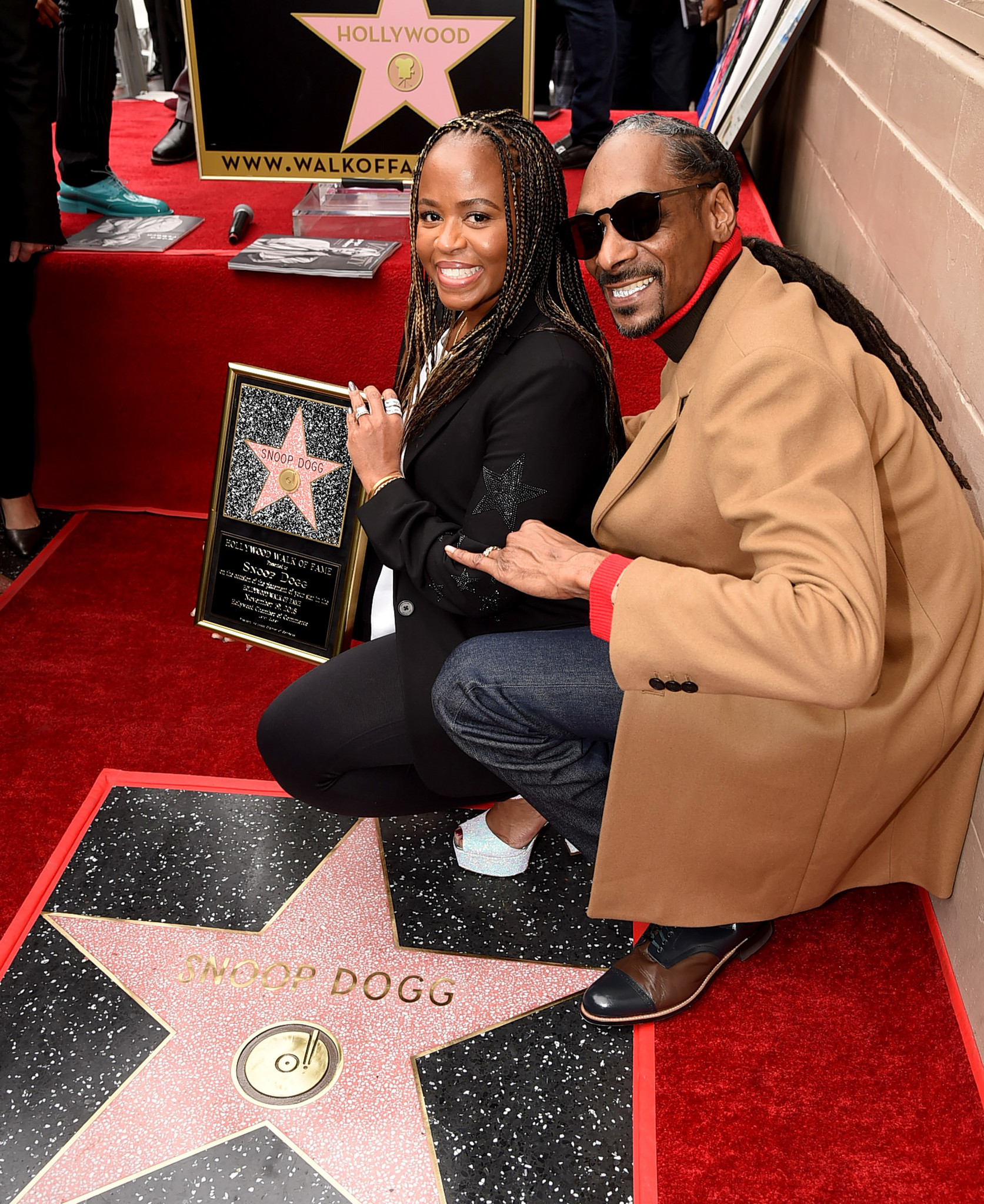 Snoop Dogg, with his wife Shante Broadus, is honored with a star on The Hollywood Walk Of Fame on Hollywood Boulevard on Nov. 19, 2018 in Los Angeles, Calif. Esteemed among his family and famous friends, Snoop Dogg's Hollywood Walk of Fame ceremony was a star-studded event including Dr. Dre, Quincy Jones, Pharrell Williams and Jimmy Kimmel.