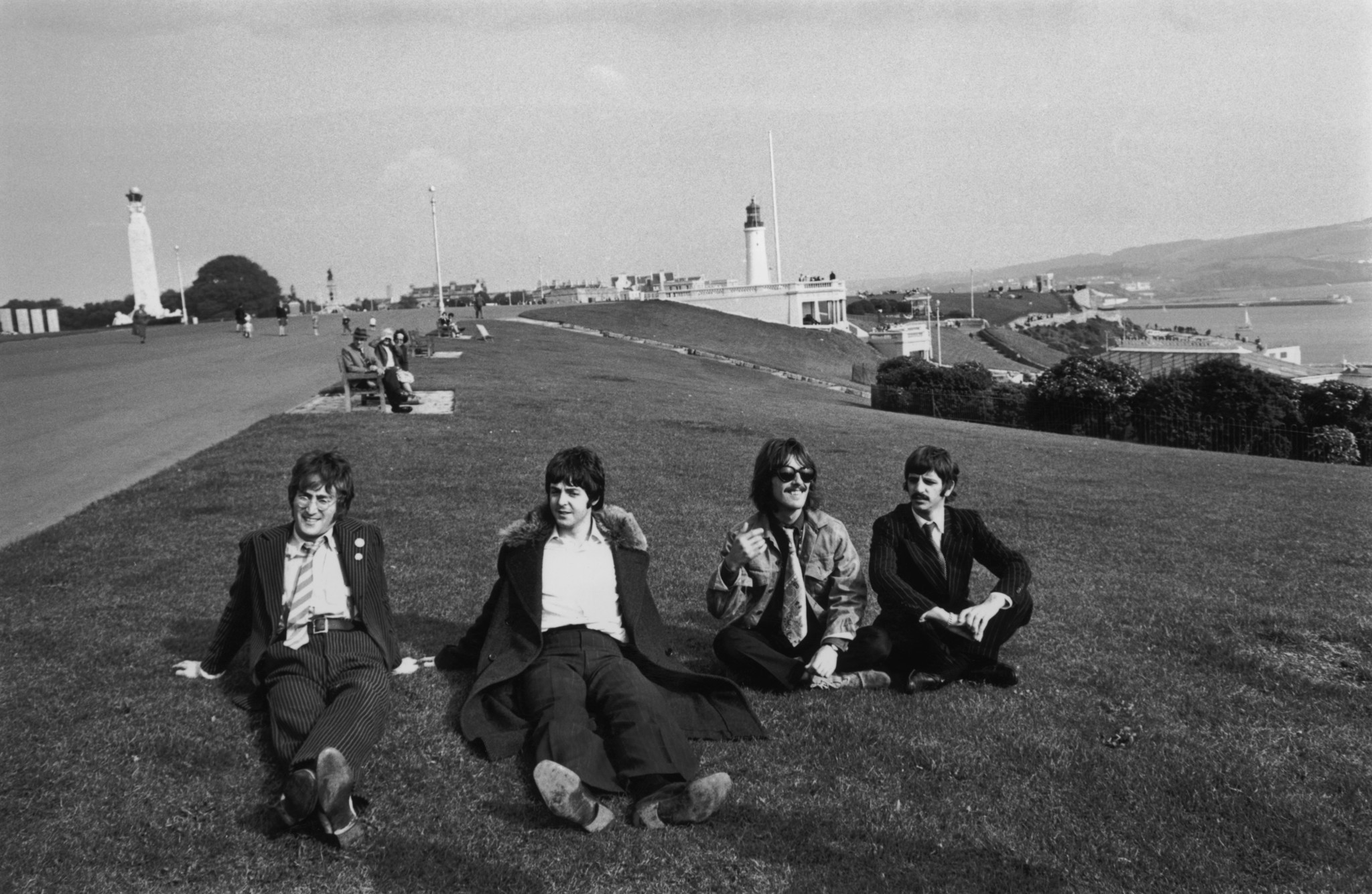 (l-r) John Lennon, Paul McCartney, George Harrison and Ringo Starr take a break during the filming of 