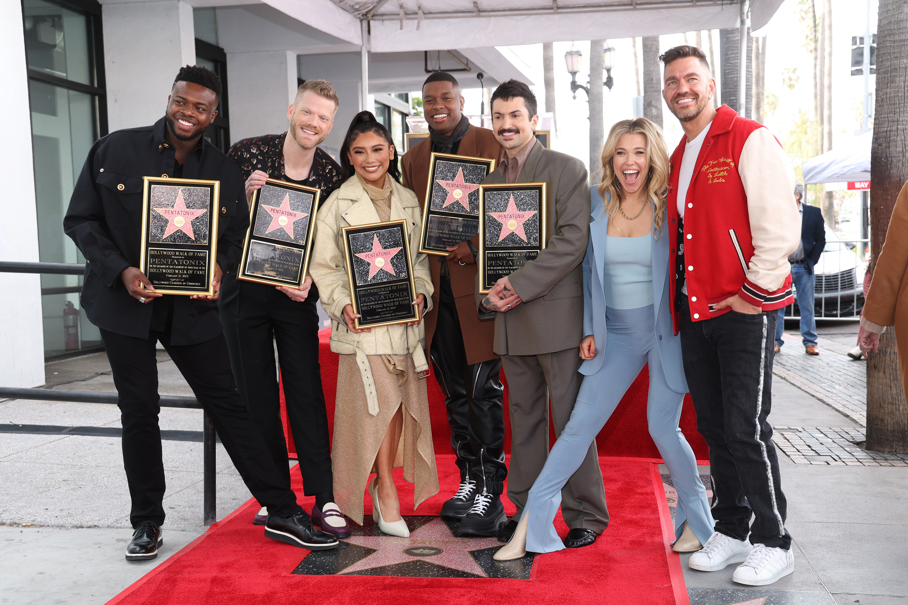 (L-R) Kevin Olusola, Scott Hoying, Kirstin Maldonado, Matt Sallee and Mitch Grassi of Pentatonix, Rachel Platten and Andy Grammer attend the star ceremony where Pentatonix is honored with a star on the Hollywood Walk of Fame on Feb. 21, 2023, in Hollywood, Calif.