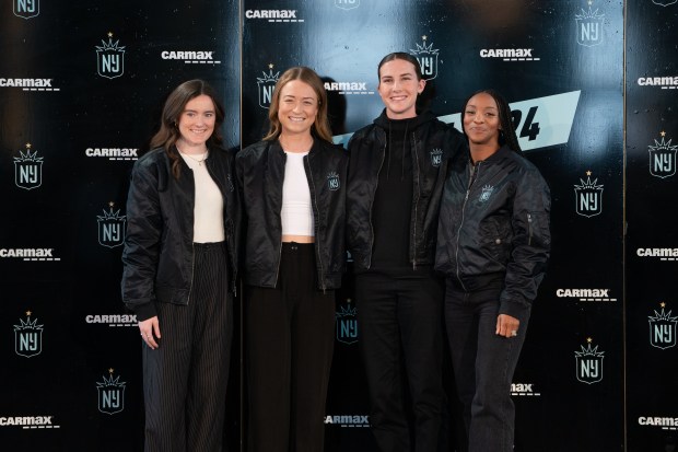 From left to right, new Gotham FC players Rose Lavelle, Emily Sonnett, Tierna Davidson, and Crystal Dunn pose for photos during an event at the Rainbow Room introducing the team's new players for 2024 on Jan. 19, 2024, in Manhattan. (Barry Williams for New York Daily News)