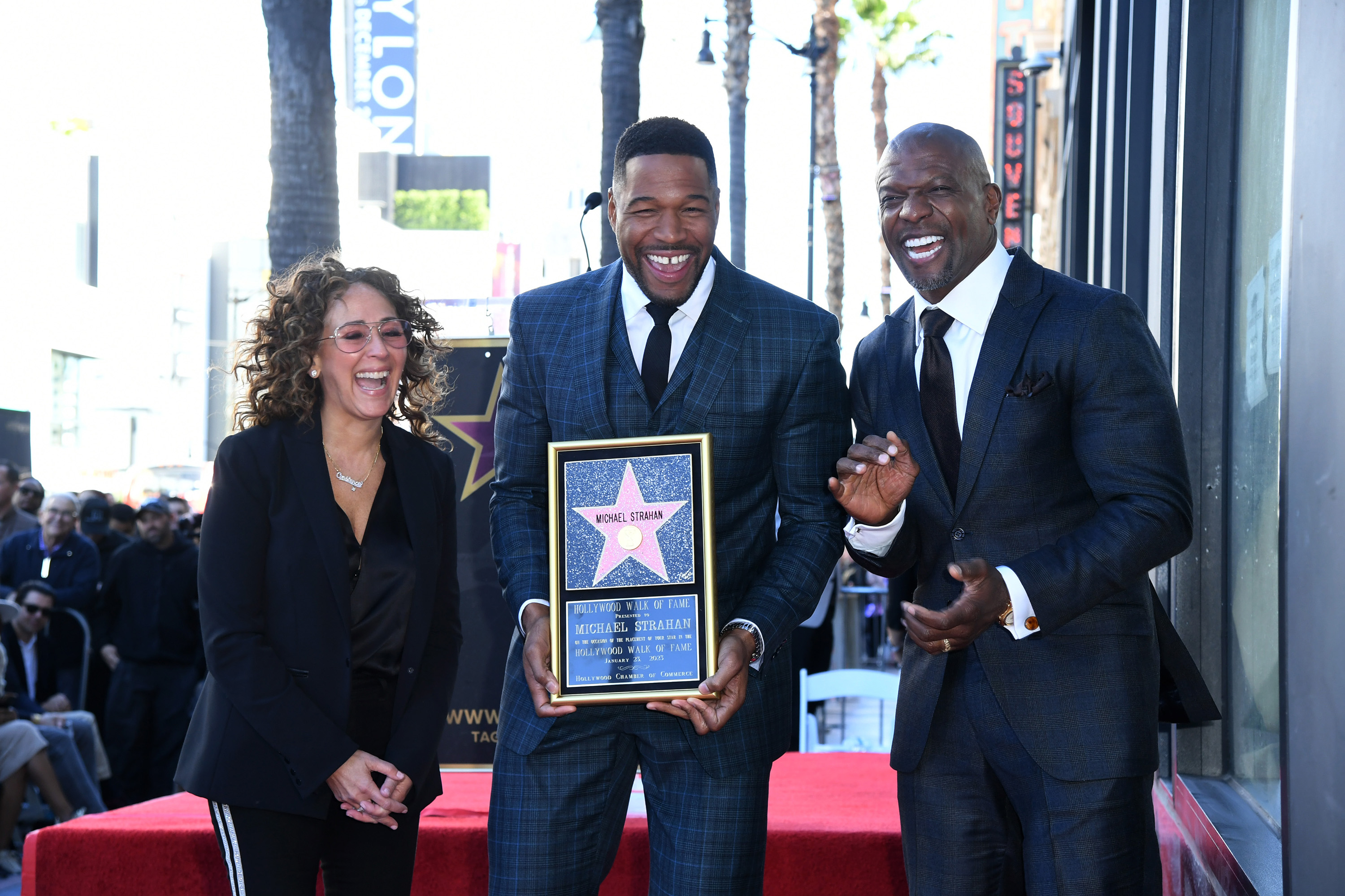 (L-R) Constance Schwartz, Michael Strahan and Terry Crews attend the Hollywood Walk of Fame star ceremony honoring Strahan on Jan. 23, 2023, in Los Angeles, Calif.